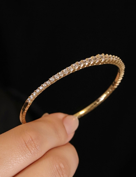 14 Ayar Altın Suyolu Süzme Kelepçe için detayları göster 14 Ayar Altın Suyolu Süzme Kelepçe resmi